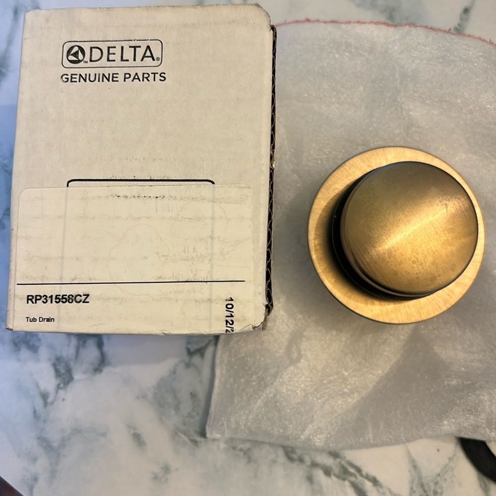 Delta tub drain - champagne bronze.